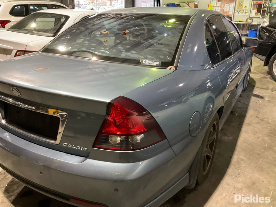 A268 - VZ HOLDEN CALAIS SEDAN - Fuel Flap - ODDYSSEY BLUE #276M