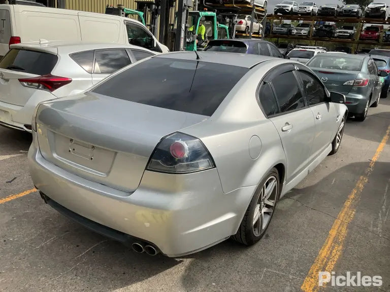 A243 - VE HOLDEN COMMODORE SEDAN - Rear Bar - NICKLE METALLIC #348N