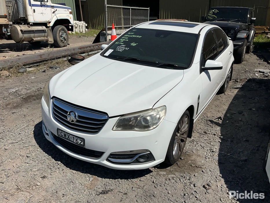 A296 - VF Holden Calais Sedan V6 LFX - Fuel Flap Herron White Paint Code #679F
