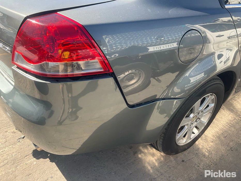 A242 - VE HOLDEN COMMODORE SEDAN - Fuel Flap ALTO GREY #7448
