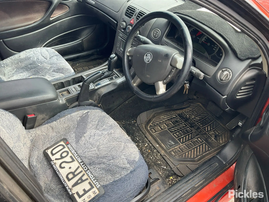 A253 - VZ Holden Crewman - Leather Steering Wheel w/ Switches & Horn Pad - TRIM #81i