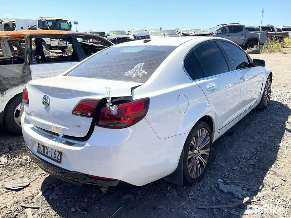 A296 - VF Holden Calais Sedan V6 LFX - Fuel Flap Herron White Paint Code #679F