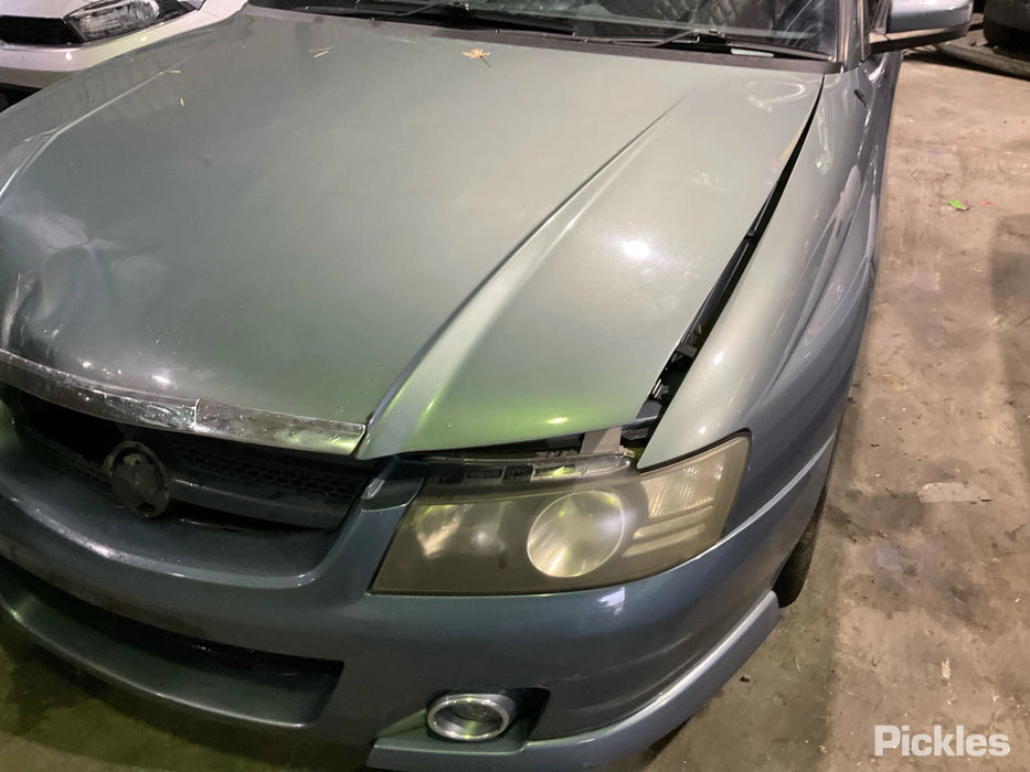 A268 - VZ HOLDEN CALAIS SEDAN - Fog Light Bezzel (PASSENGER SIDE)