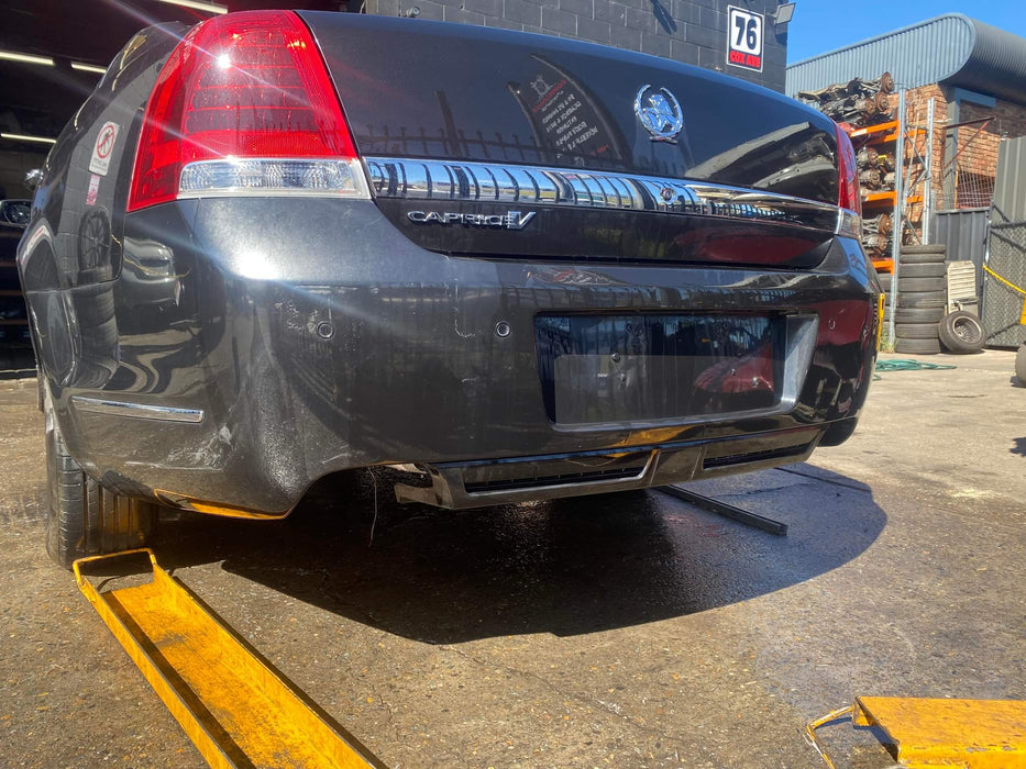 A114 - WN HOLDEN CAPRICE V SERIES SEDAN - REAR BARS - PHANTOM BLACK #690F