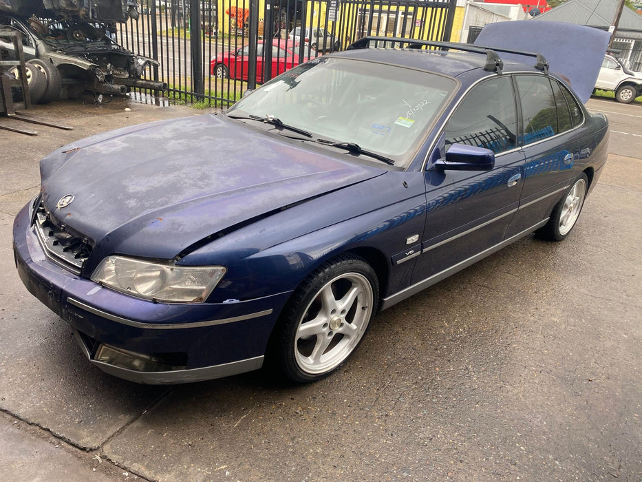 A119 - WK HOLDEN COMMODORE SEDAN - BOOT GARNISH - BLUE