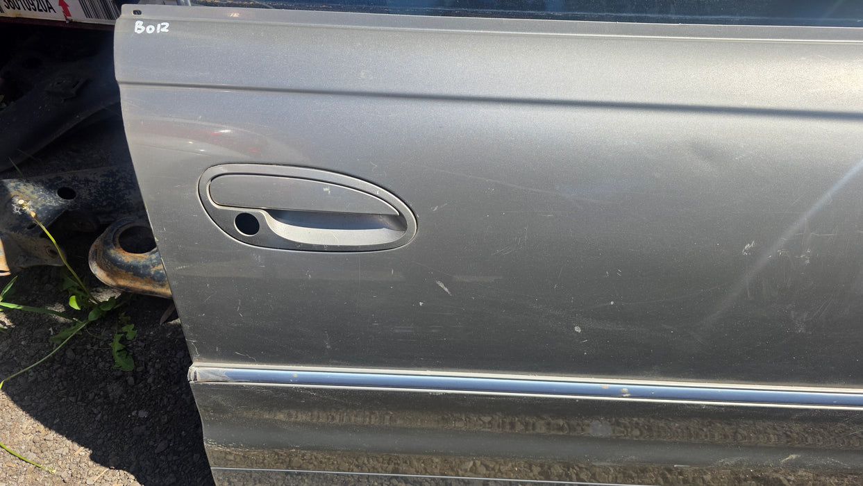 WH - HOLDEN STATESMAN - DRIVERS FRONT DOOR - PAINT CODE SILVER
